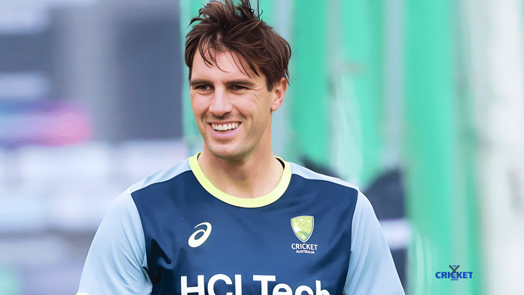 Australian cricketer Pat Cummins smiling in team training gear.