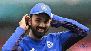 KL Rahul, Indian cricket star, in team kit, smiling confidently.