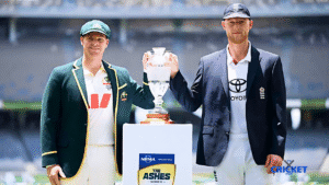 Two cricketers holding a trophy during The Ashes award ceremony at the stadium.