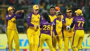 UP Warriorz cricket team celebrating on the field during WPL 2026.