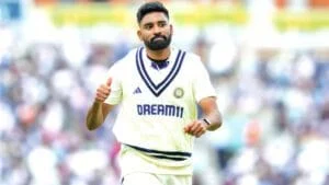 Mohammed Siraj in cricket uniform during Ranji Trophy match.