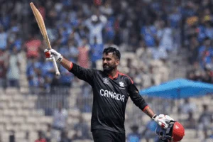 Young cricket player celebrating after scoring a century in T20 World Cup 2026.